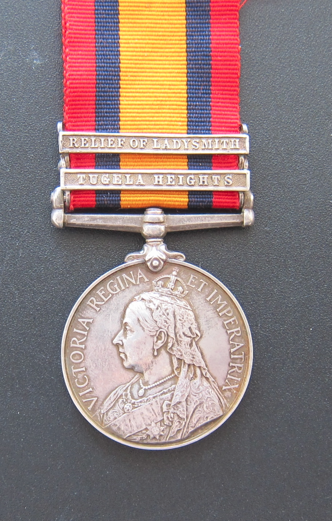 Queen&rsquo;s South Africa Medal with Tugela Heights and Relief of Ladysmith clasps.
